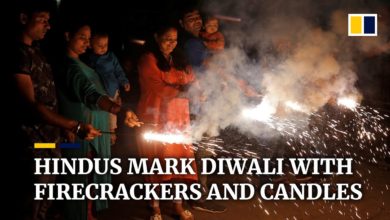 Hindus across India celebrate Diwali festival of lights with firecrackers and candles