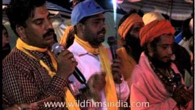 Pilgrims chant hyms hailing Hindu God Shiva at Amarnath camp, Kashmir