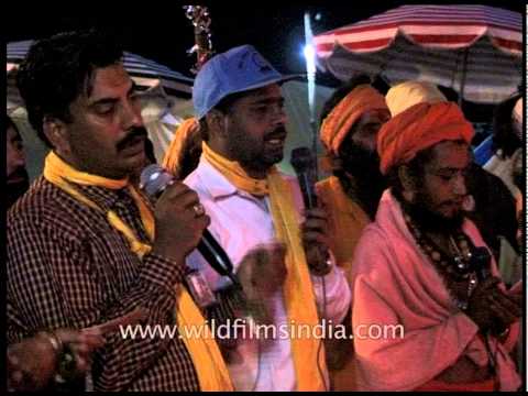 Pilgrims chant hyms hailing Hindu God Shiva at Amarnath camp, Kashmir