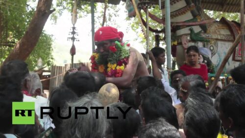 India: Watch priest drink blood from goat's neck to honour Hindu god *GRAPHIC*